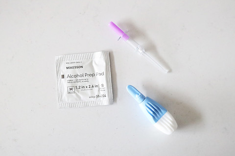viome test kit contents (lancet, alcohol pad, stool collector)