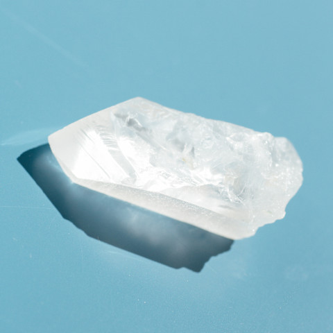 Clear Quartz on a blue background Clear Quartz on a blue background