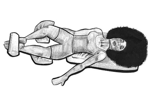 Supported reclining bound angle pose—Supta baddha konasana Supported reclining bound angle pose—Supta baddha konasana