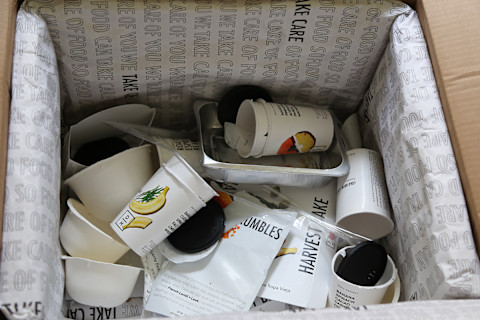 Leftover waste from Daily Harvest box including recyclable cups, aluminum pans, Leftover waste from Daily Harvest box including recyclable cups, aluminum pans,