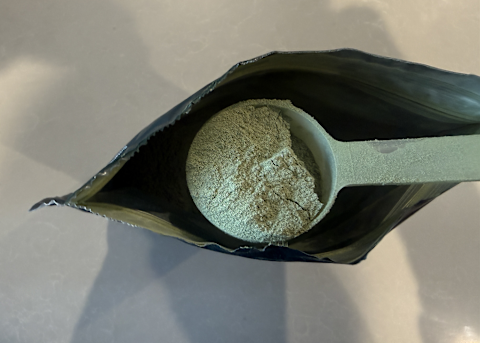 Quince Green Powder open bag with scoop