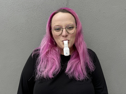 Tester with exciteoSA in her mouth