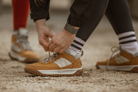 Close up of Timberland GreenStride Motion 6 Low Lace-Up Hiking Shoes being tied on mountain