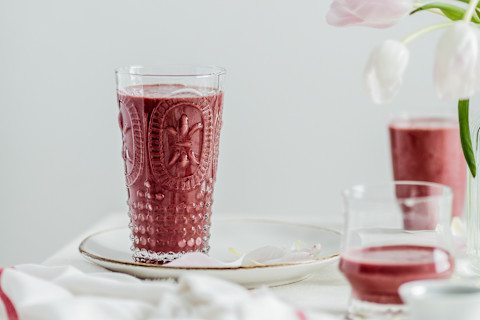 Red smoothie in a pretty glass Red smoothie in a pretty glass