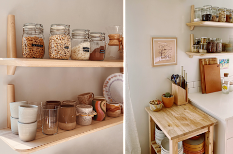 kitchen corner with wood island and floating shelves