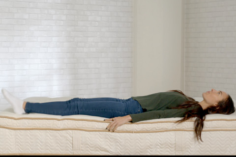 Saatva Latex Hybrid Laying on Back Sleeping