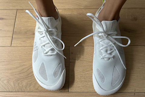 writer's feet in the vivobarefoot motus strength shoes