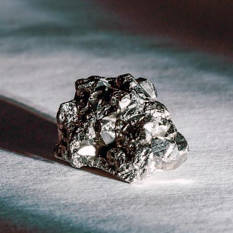 Fool's Gold / Pyrite Illuminated by a Beam of Light Fool's Gold / Pyrite Illuminated by a Beam of Light