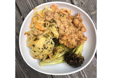 Broccoli, chickpeas and cabbage in a white bowl Broccoli, chickpeas and cabbage in a white bowl