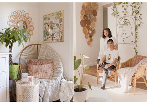 couple posing in living room of calming home with wood accents