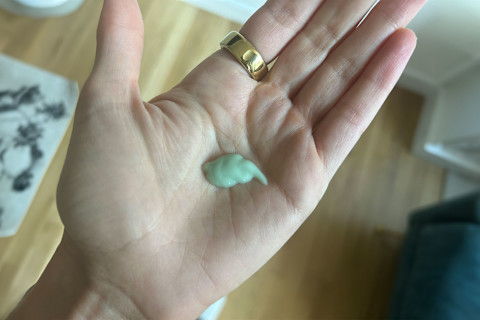 photo of OSEA hyaluronic body serum in writer's hand