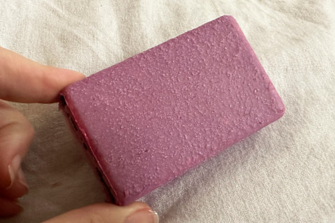 close up of soft services debaser buffing bar to show texture
