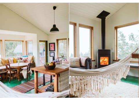 living room in home with green floors, soft hammock, and fireplace