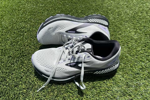 Brooks Adrenaline GTS 22 sneakers on grass