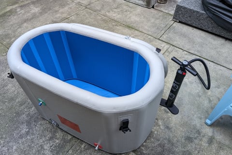 Inergize Cold Plunge Tub Inflated with pump next to it but empty