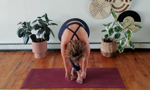 cross legged forward fold yoga pose