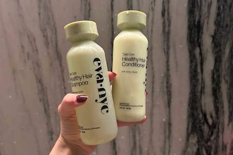 eva nyc take care healthy hair duo in writer's hand in shower