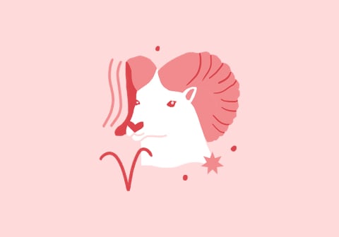 aries sign over light pink background