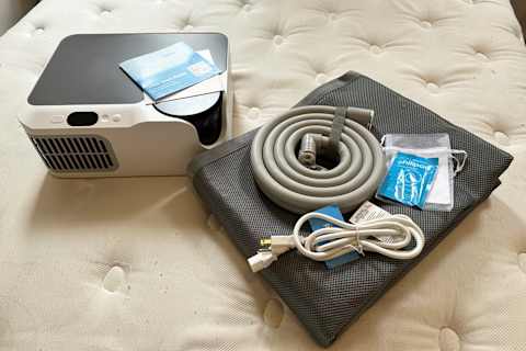 sleepme chilipad dock pro unboxed on mattress