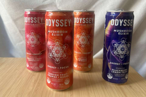 Odyssey Elixir Core in pink, red, orange, purple can side-by-side