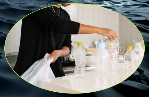 woman clearing plastic bottles at home