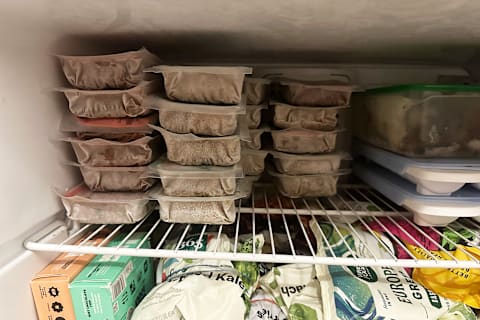 ollie pet food frozen package stacked in freezer