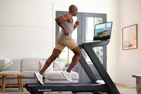 NordicTrack’s Commercial 2450 treadmill with man running