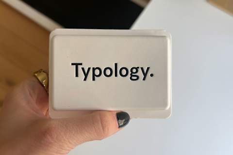 photo of typology bar in packaging in writer's hand