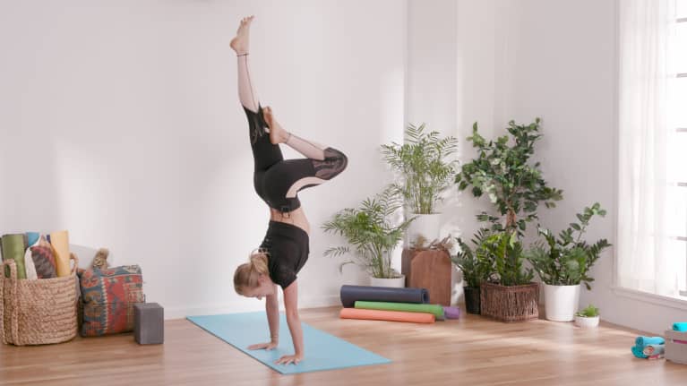 Yoga Inversions 101: How To Do Handstands, Headstands & More With Ease