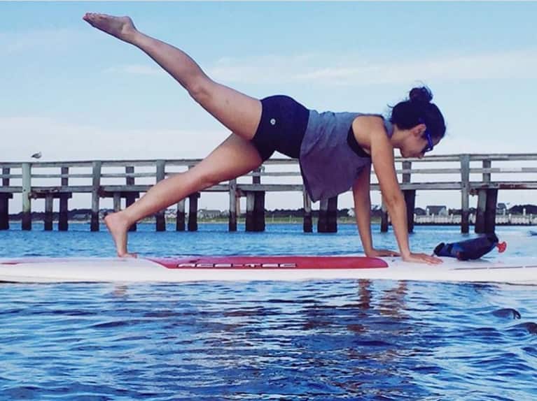 5 Ways To Get A Barre Workout In On A Stand Up Paddleboard Mindbodygreen