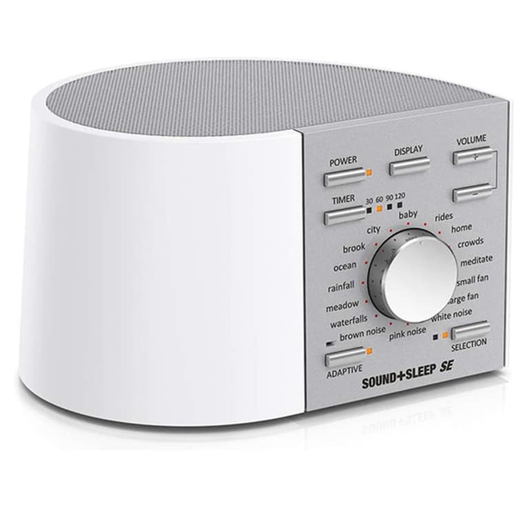 square speaker in white and grey with sound knob