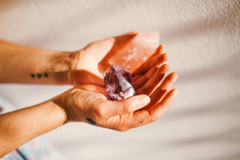 Woman's Hand Holding Crystals