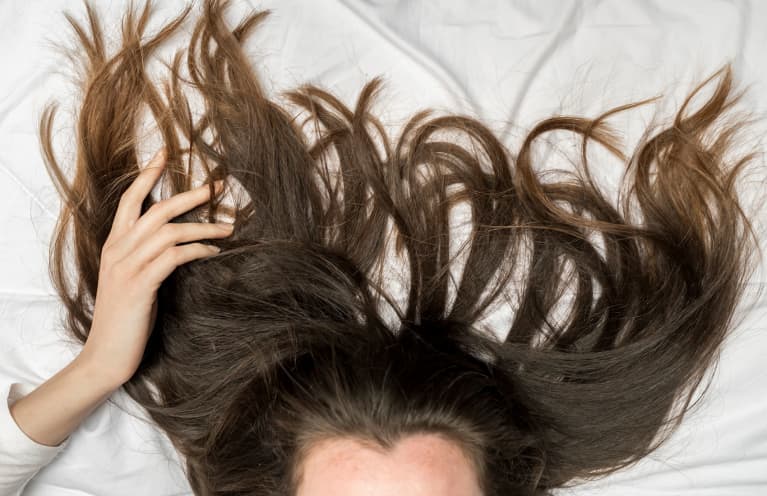 Is This The Key To Longer & Thicker Hair? What The Research Says