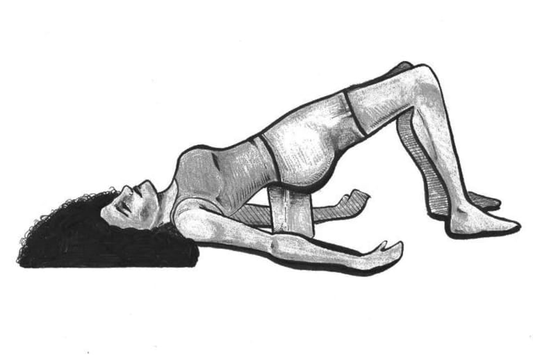 Supported bridge pose—Setu bandha sarvangasana