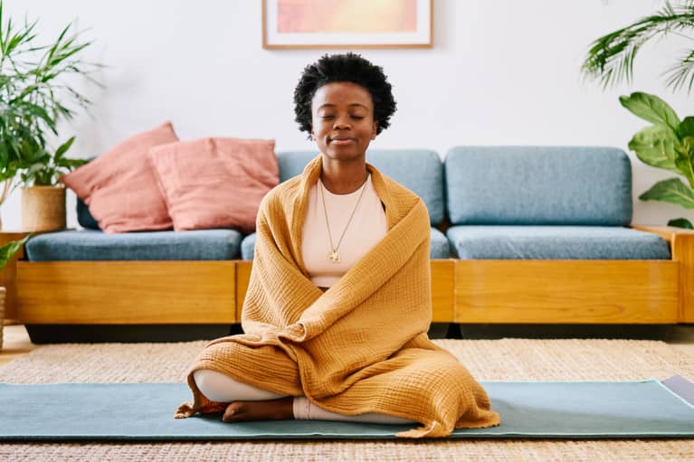 Woman Meditating at Home Woman Meditating at Home