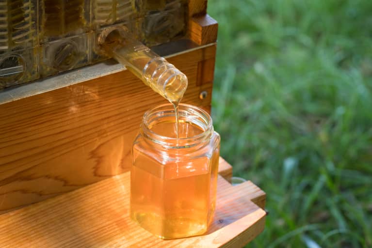 honey dripping out of flow hive