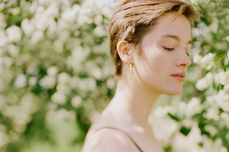 Peaceful Young Woman in Springtime