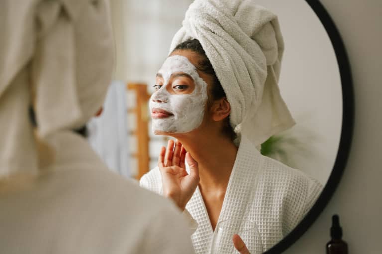 Young Woman Taking a Moment For Self Care With a Face Mask