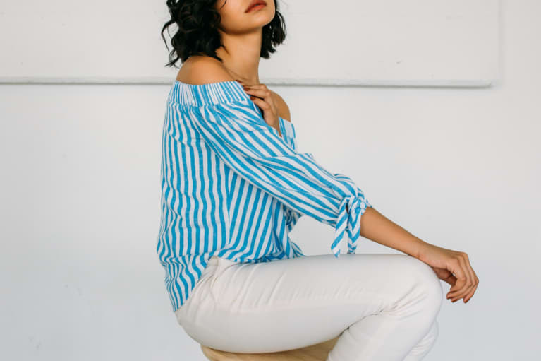 Woman in a Striped Shirt Looking Upset