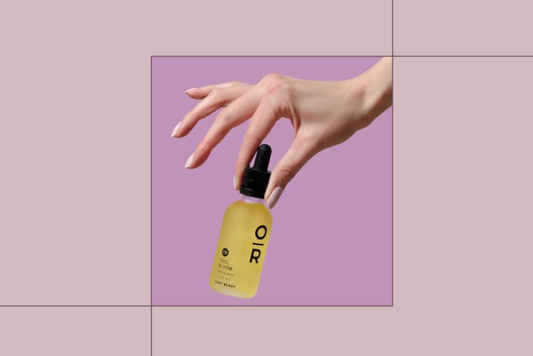 The Best CBD Oils Onxy + Rose Held By Hand