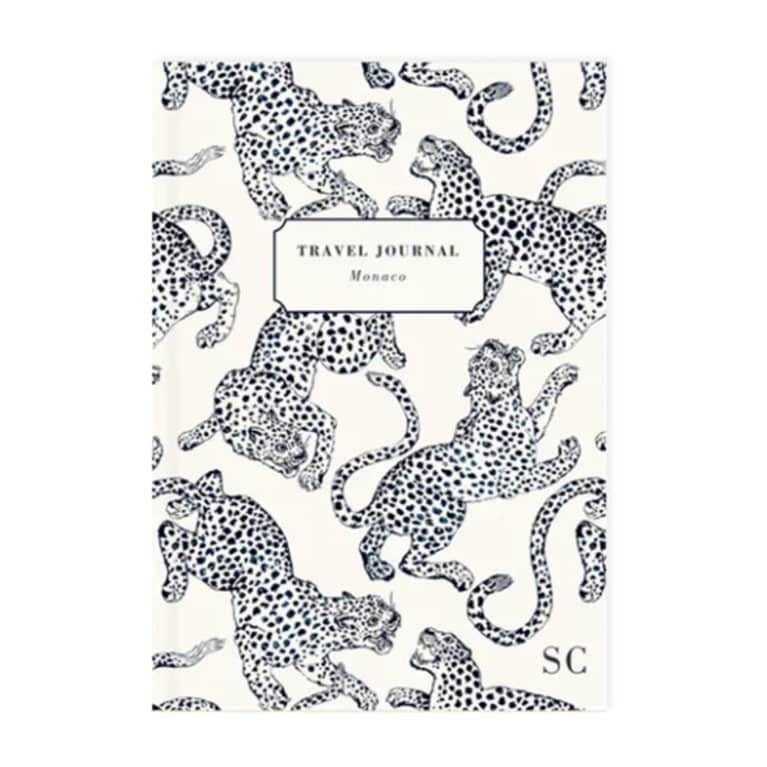 white journal with jaguar pattern on cover