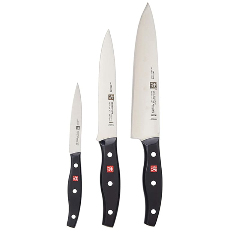 three knives with black handles three knives with black handles
