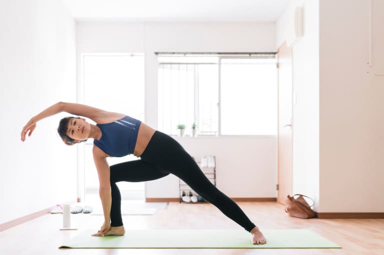 Woman doing yoga at home