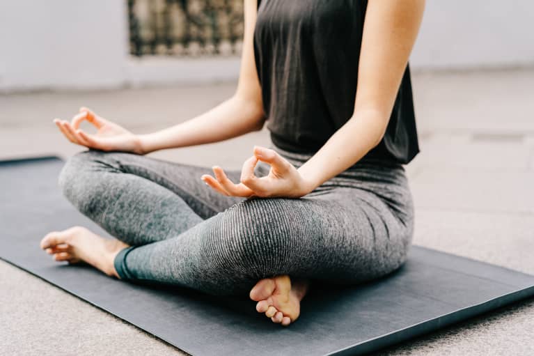 Woman Doing Yoga Outdoors At The City, Jnana Mudra