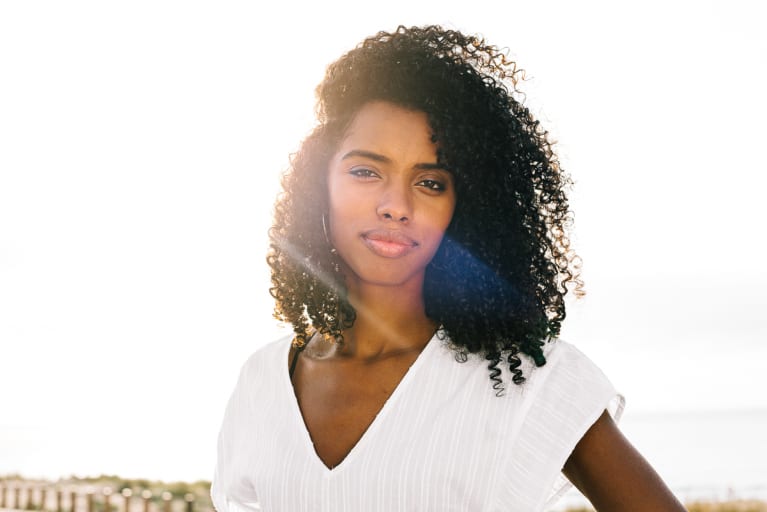 Portrait of a Young Woman Standing in The Sunshine Portrait of a Young Woman Standing in The Sunshine