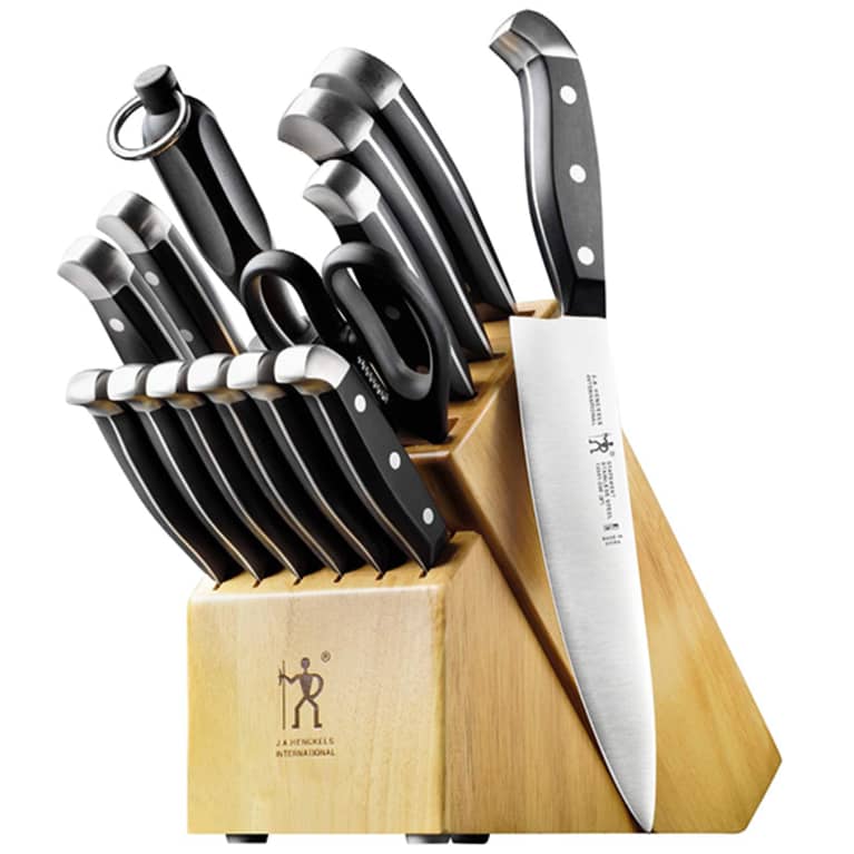wood knife block with many knives wood knife block with many knives