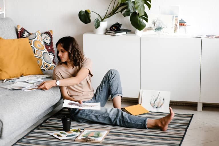 Woman Sitting on Living Room Floor Painting