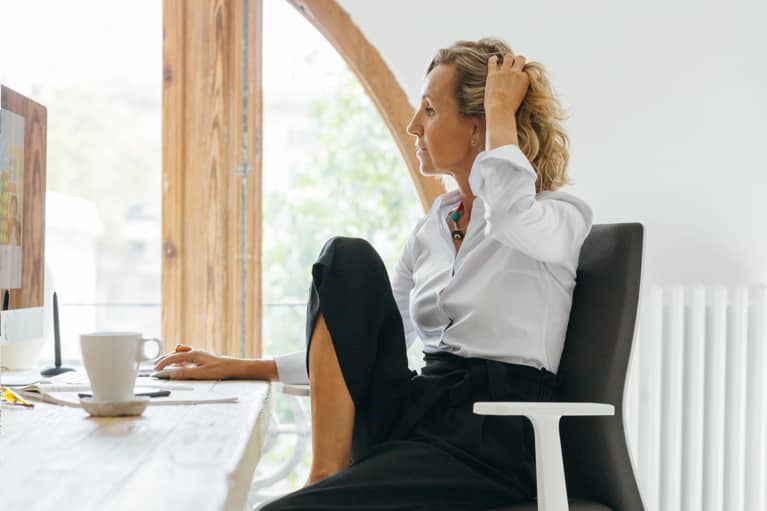 Business Woman Working At Her Desk