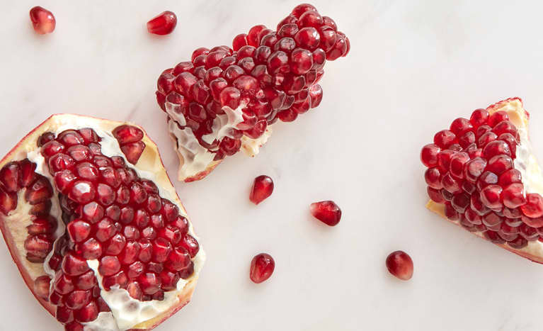 Slices Of Fresh Natural Juicy Pomegranate Fruit.