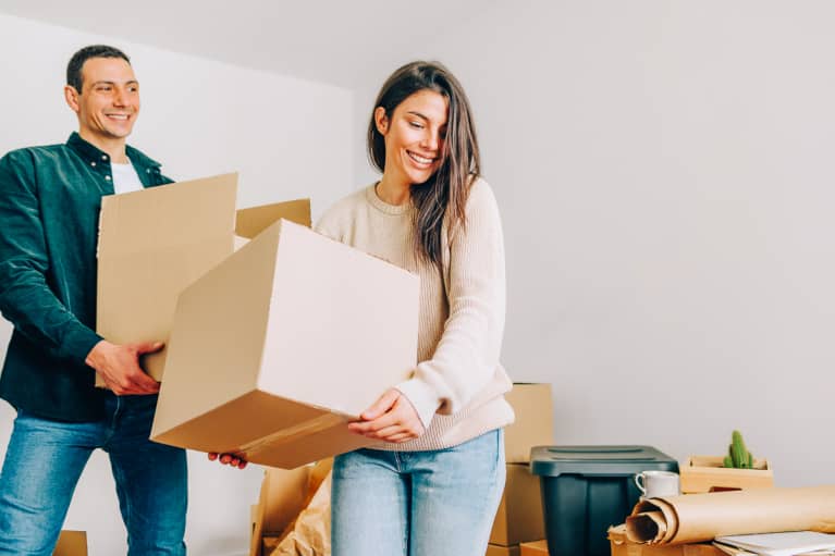 Couple Moving In Together with Boxes
